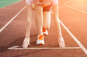 Mudança no bolsa atleta, mulher em pista de corrida